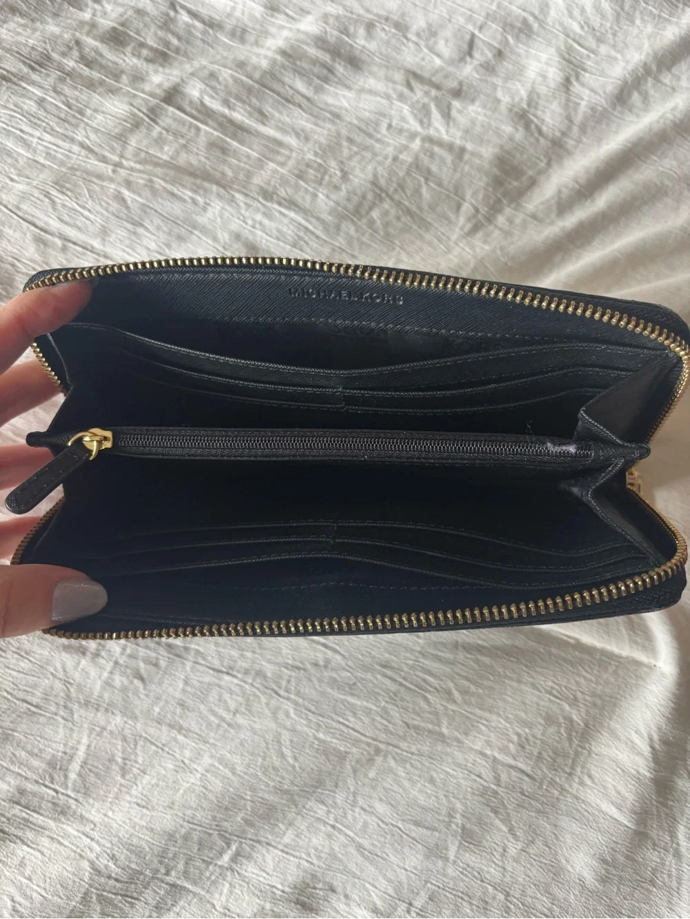 Michael Kors Black Zip Wallet with Gold MK Emblem